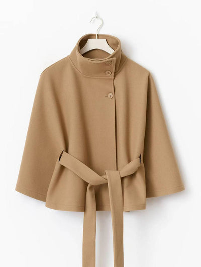 Manteau femme boutonnage ceinture col montant manches cape