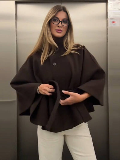 Manteau femme boutonnage ceinture col montant manches cape