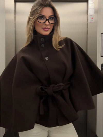 Manteau femme boutonnage ceinture col montant manches cape